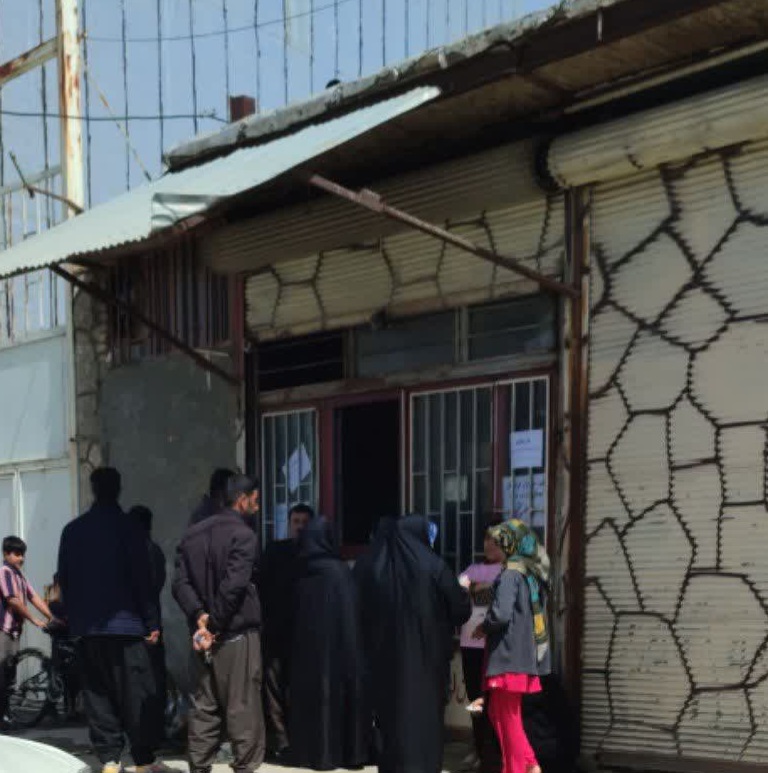 آیین توزیع نان رایگان در کرمانشاه برگزار شد.